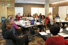 NWPHLI scholars and director Michelle Sarju, MSW, listen to public health leaders discuss their paths to leadership